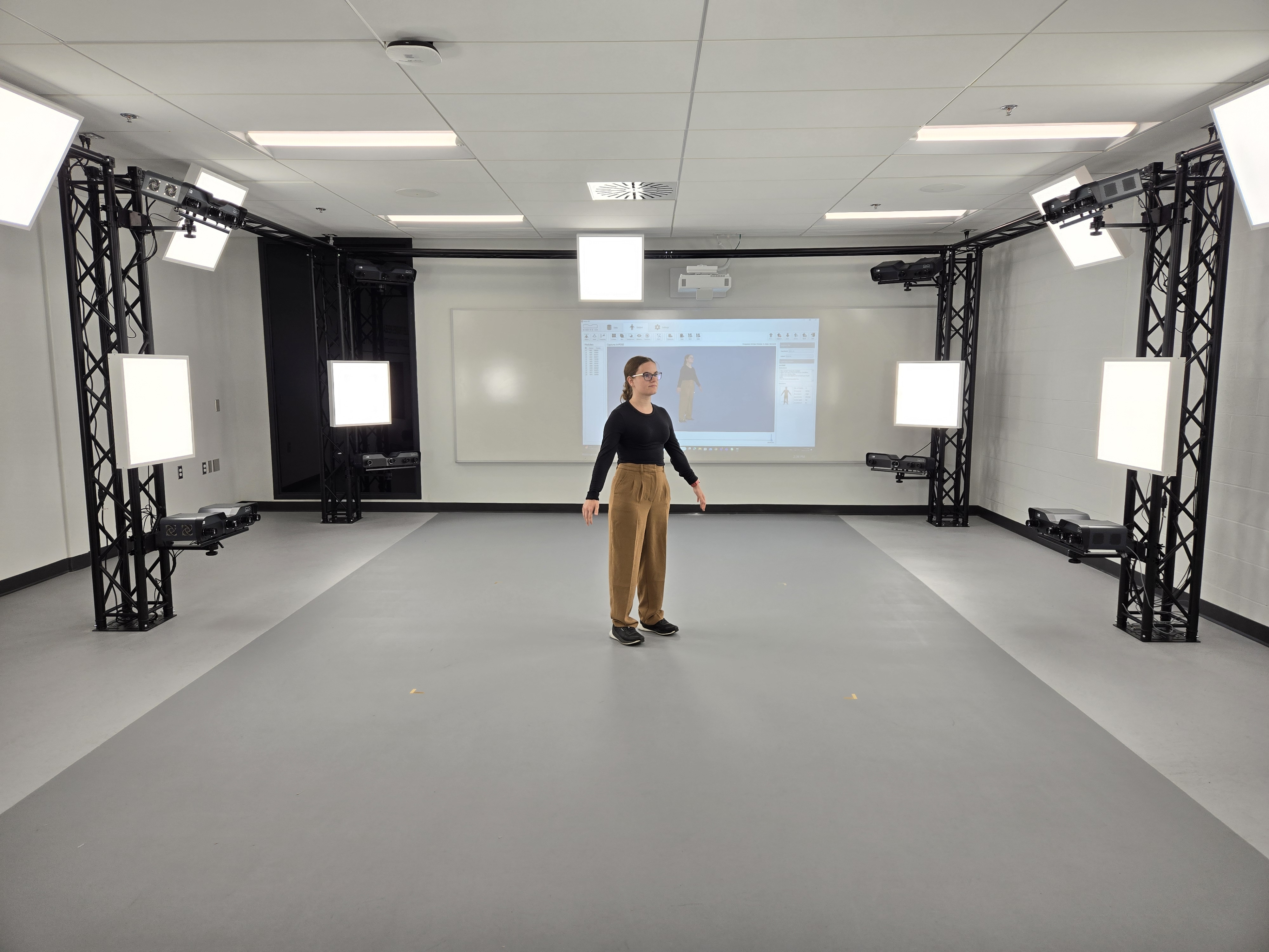 Research participant standing in the middle of 10-camera MOVE 4D system in the CISWP STRIDE lab.