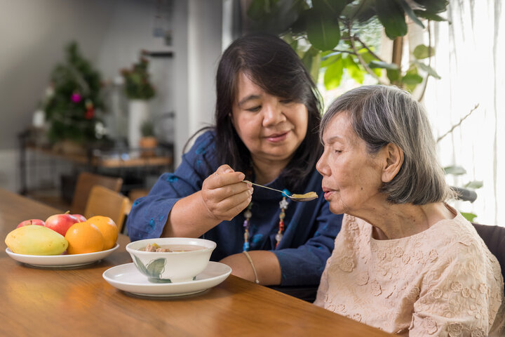 Feeding an elderly 